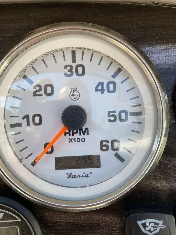Slide: The Image of 2007 Stingray 195LR/LS/LX tachometer showing RPM gauge with orange needle. - 2