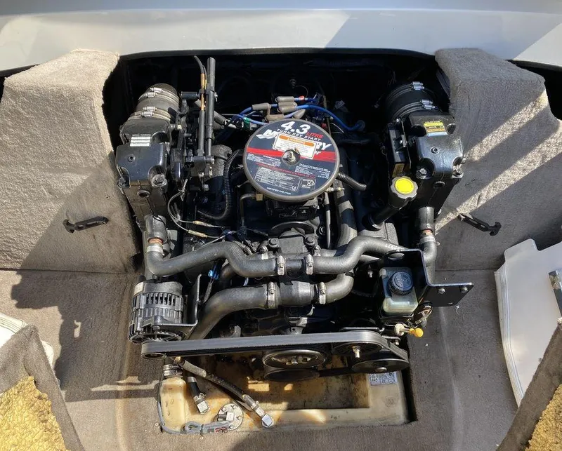 Slide: The Image of 2007 Stingray 195LR/LS/LX engine compartment with visible components and wiring. - 3