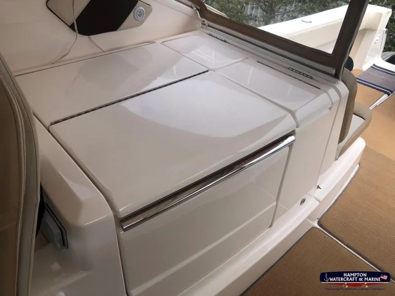 Slide: The Image of 2013 Tiara Yachts 3600 Coronet interior detail with sleek white cabinetry and seating. - 11