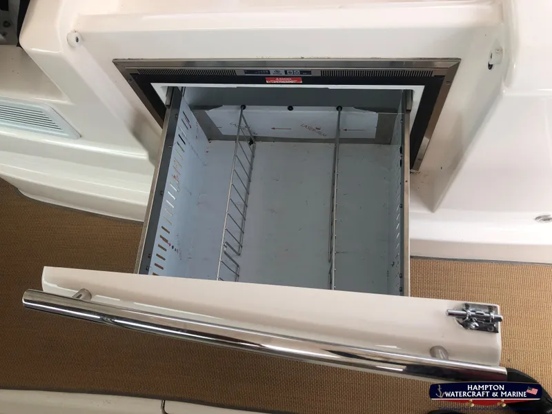 Slide: The Image of Open storage compartment on 2013 Tiara Yachts 3600 Coronet boat. - 14