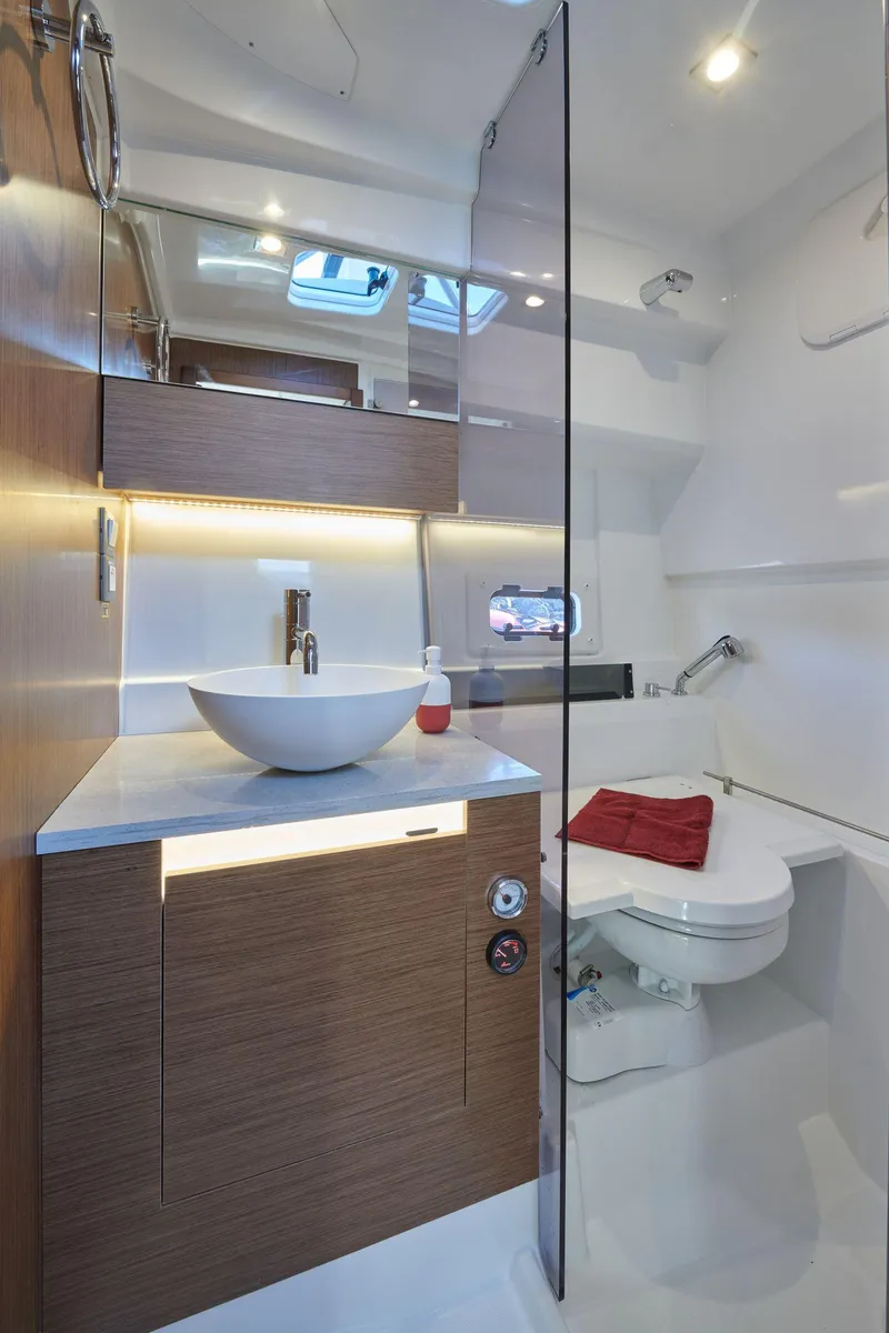 Slide: The Image of 2025 Jeanneau Leader 10.5 WA Series 2 bathroom with modern sink and toilet. - 11