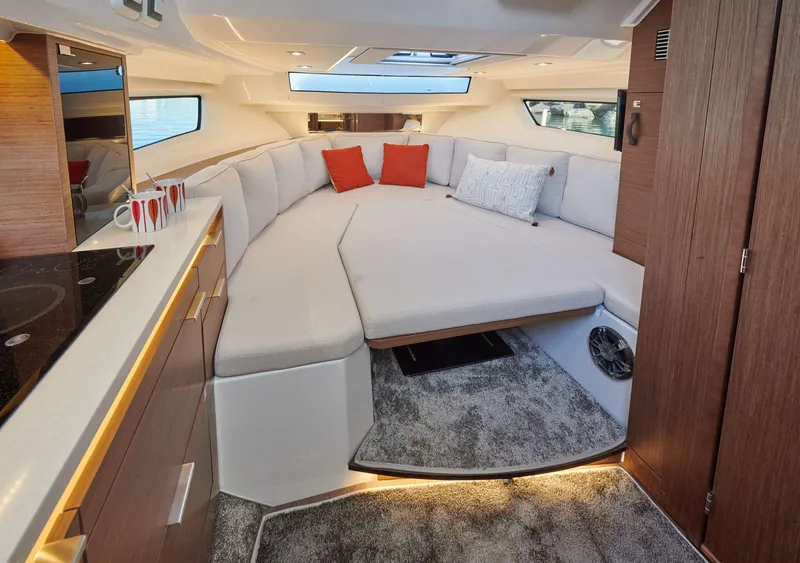 Slide: The Image of 2025 Jeanneau Leader 10.5 WA Series 2 interior with modern seating and stylish decor. - 9
