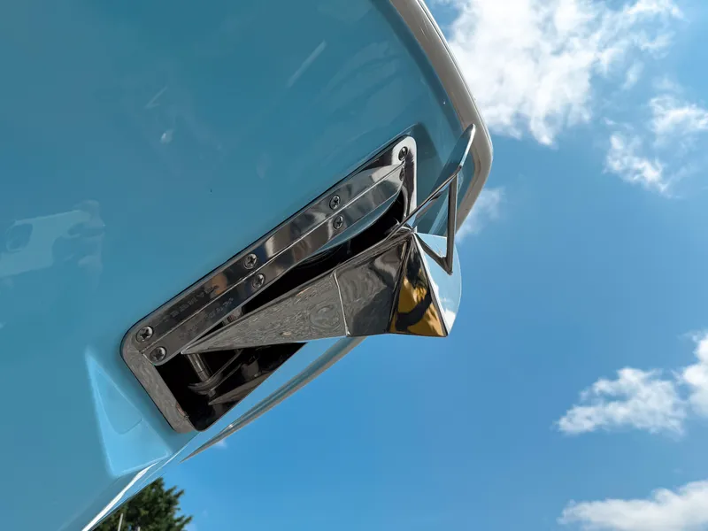 Slide: The Image of 2025 Pursuit S 288 Sport boat anchor against blue sky. - 4