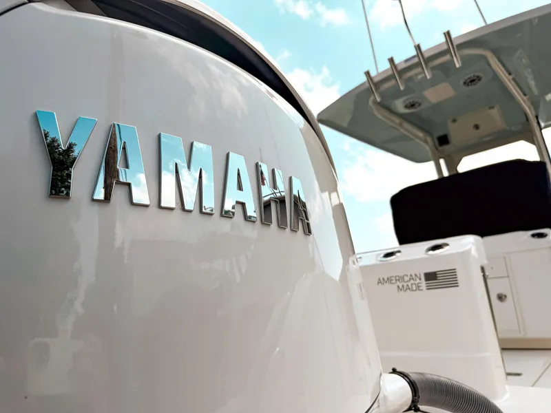 Slide: The Image of 2025 Pursuit S 288 Sport boat with Yamaha engine, showcasing "American Made" label. - 6
