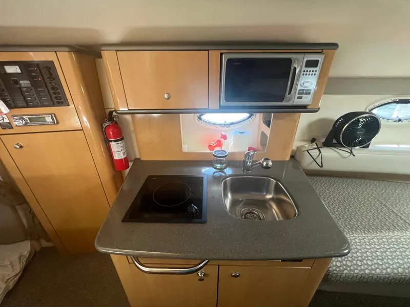 Slide: The Image of Galley in a 2004 Maxum 2700 SE yacht. - 16