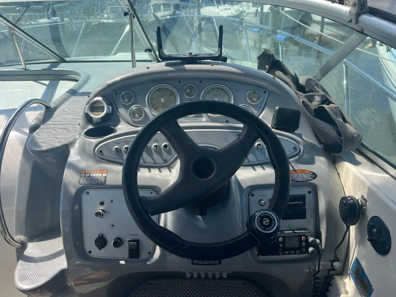 Slide: The Image of Cockpit of a 2004 Maxum 2700 SE boat. - 2