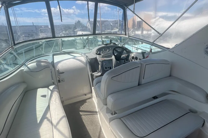 Slide: The Image of Interior of a 2004 Maxum 2700 SE boat with helm station. - 6
