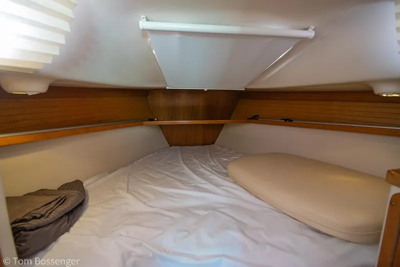 Slide: The Image of Cozy cabin interior of 2006 Catalina 34' MKII sailboat with bedding and cushions. - 16
