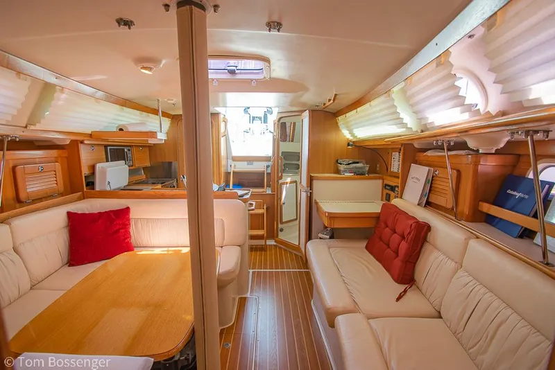 Slide: The Image of Interior of 2006 Catalina 34' MKII sailboat with cozy seating and wooden finishes. - 17