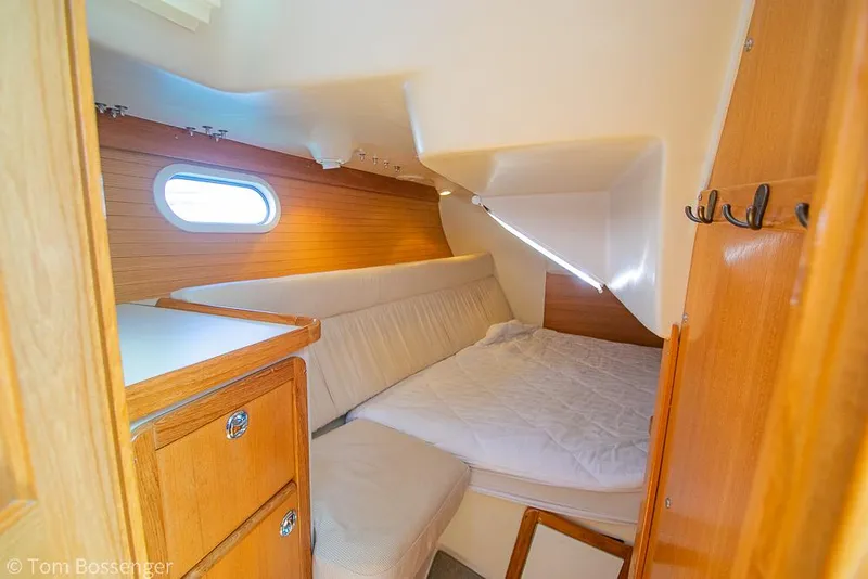 Slide: The Image of Cozy cabin interior of 2006 Catalina 34' MKII sailboat with wooden furnishings. - 18