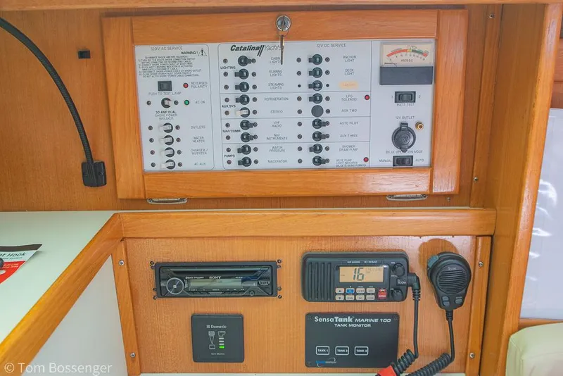 Slide: The Image of Electrical control panel of a 2006 Catalina 34' MKII sailboat with radio and navigation equipment. - 23