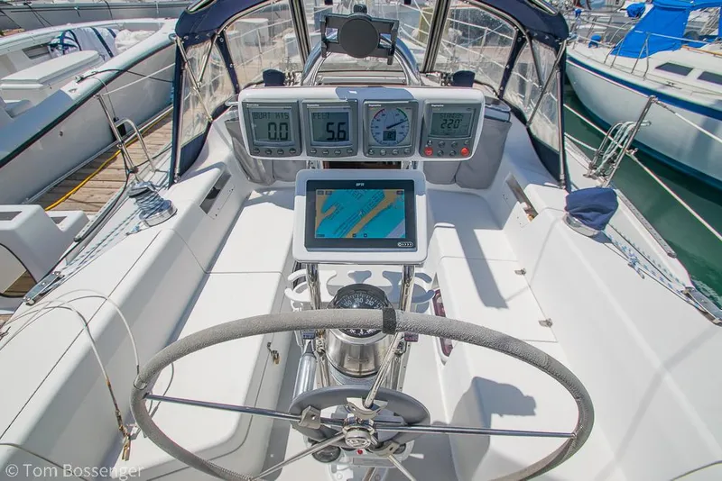 Slide: The Image of Cockpit of 2006 Catalina 34' MKII sailboat with navigation instruments and steering wheel. - 25