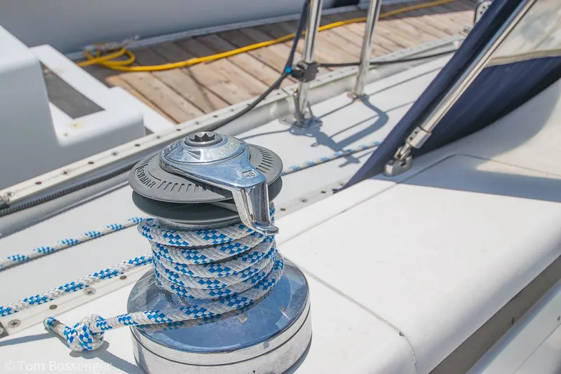 Slide: The Image of Winch on 2006 Catalina 34' MKII sailboat deck with coiled rope. - 29