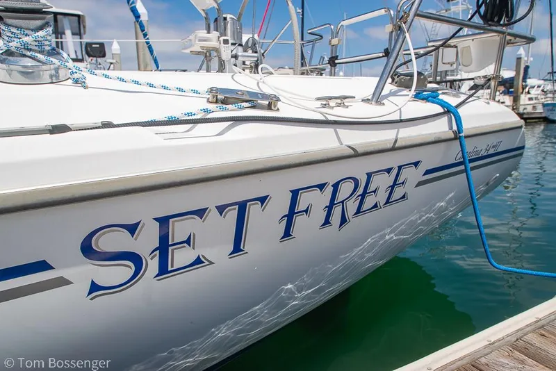 Slide: The Image of Catalina 34' MKII 2006 sailboat named "Set Free" docked at marina. - 4