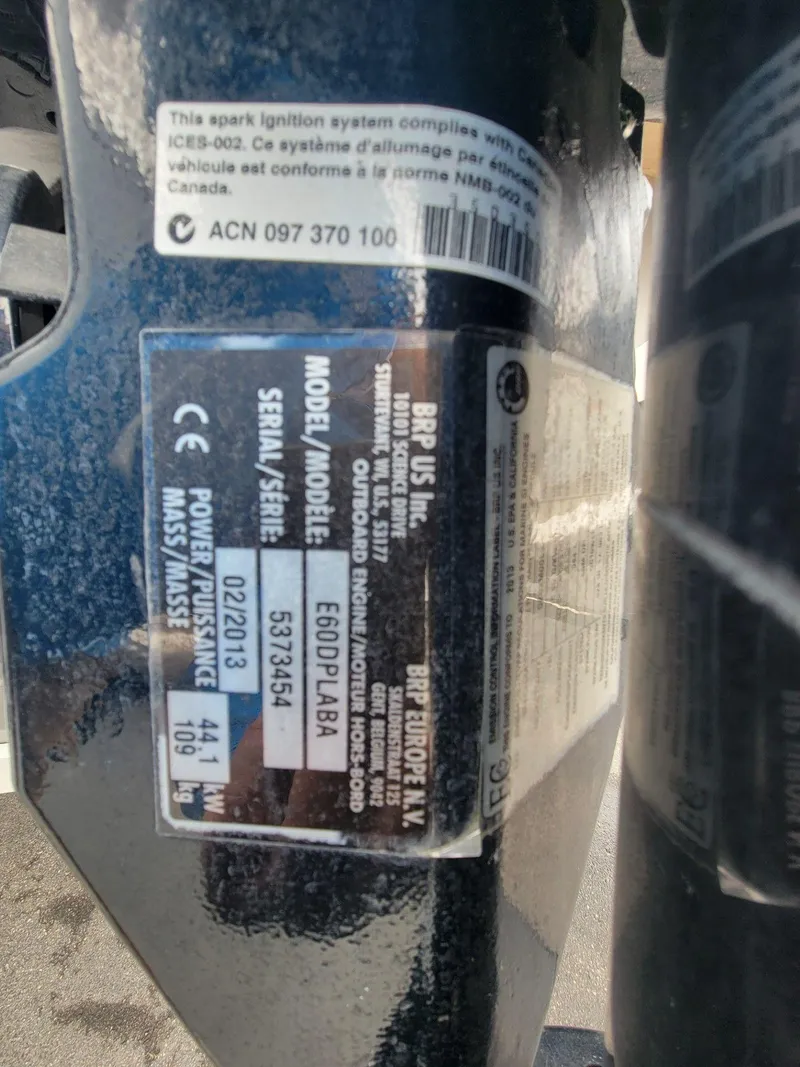 Slide: The Image of Label on a 2013 Lund 1650 Rebel XL Tiller, displaying model and serial information. - 34
