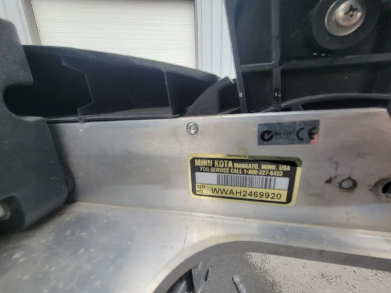 Slide: The Image of Close-up of a Minn Kota motor label on a 2013 Lund 1650 Rebel XL Tiller. - 5