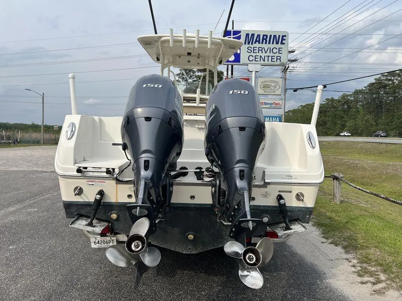 Slide: The Image of 2017 Sailfish 270 CC boat with twin 150 horsepower engines at marine service center. - 8