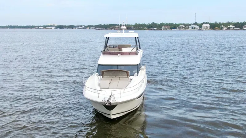 Slide: The Image of 2019 Prestige 520 yacht on calm water, front view. - 3