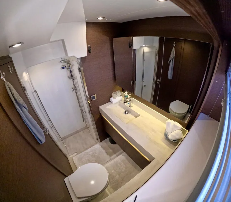 Slide: The Image of Luxurious bathroom in 2019 Prestige 520 yacht with modern fixtures and elegant design. - 38