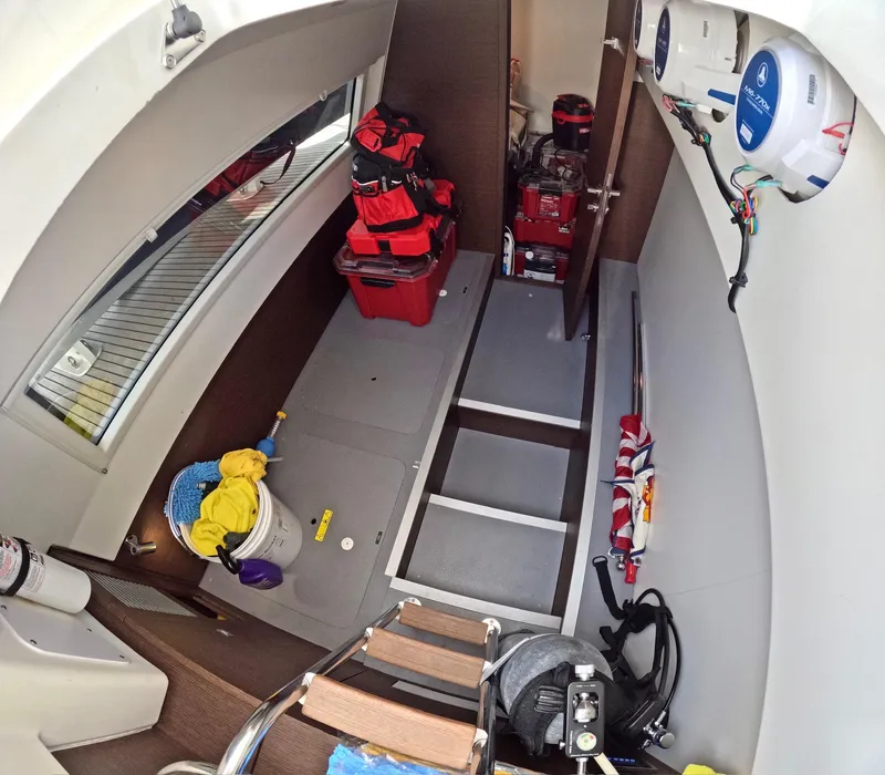 Slide: The Image of Interior of a 2019 Prestige 520 yacht, featuring storage and equipment. - 40