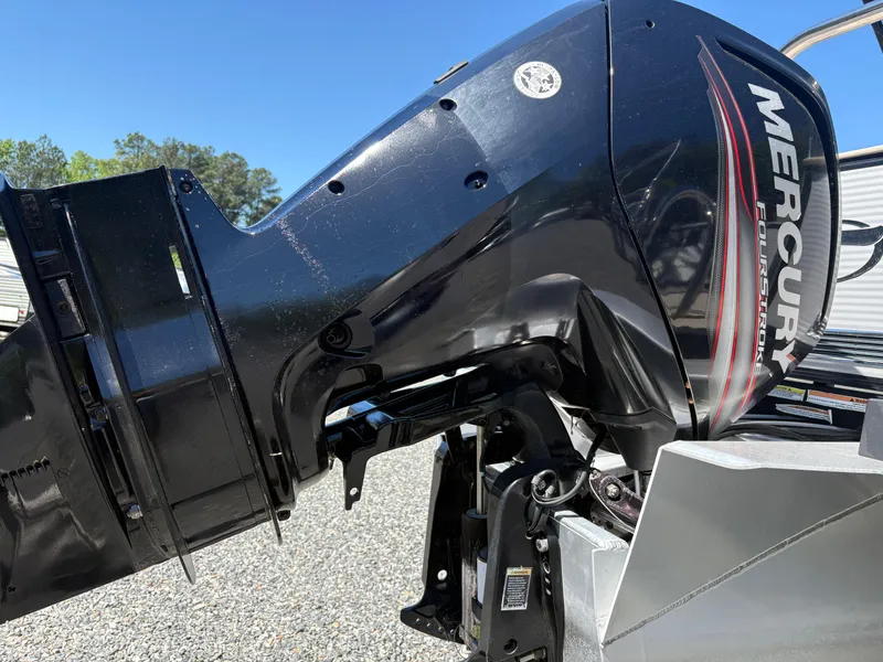 Slide: The Image of 2018 Avalon LSZ Quad Lounger with Mercury outboard motor, side view. - 12