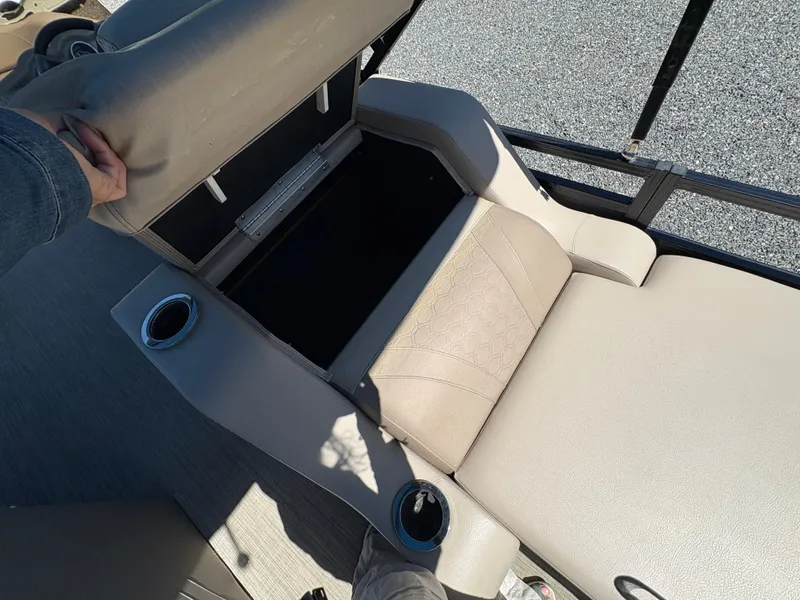 Slide: The Image of 2018 Avalon LSZ Quad Lounger seat with storage compartment and cup holders. - 7