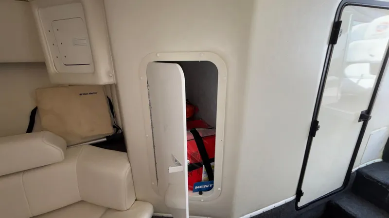 Slide: The Image of Interior of 2003 Fountain 47 Lightning boat with storage compartment and seating. - 28