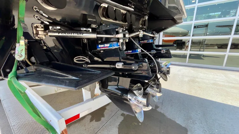 Slide: The Image of Rear view of a 2003 Fountain 47 Lightning boat with dual propellers. - 32