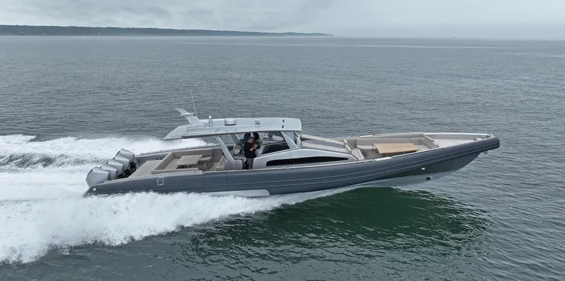Slide: The Image of 2023 Novamarine Black Shiver 160 cruising on open water, showcasing sleek design and performance. - 0