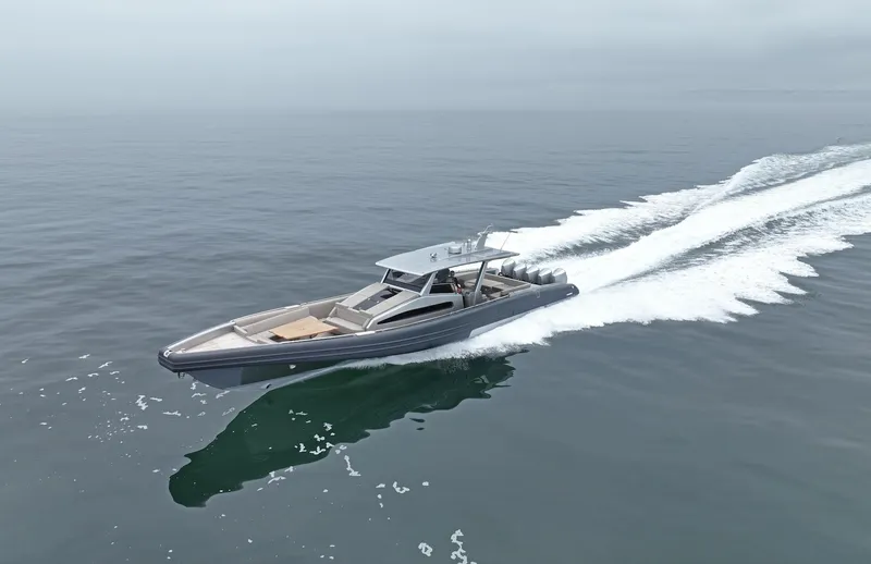 Slide: The Image of Novamarine Black Shiver 160, 2023 model, cruising swiftly on open water. - 3