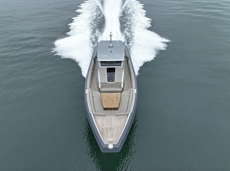 Slide: The Image of 2023 Novamarine Black Shiver 160 cruising on open water, aerial view. - 4