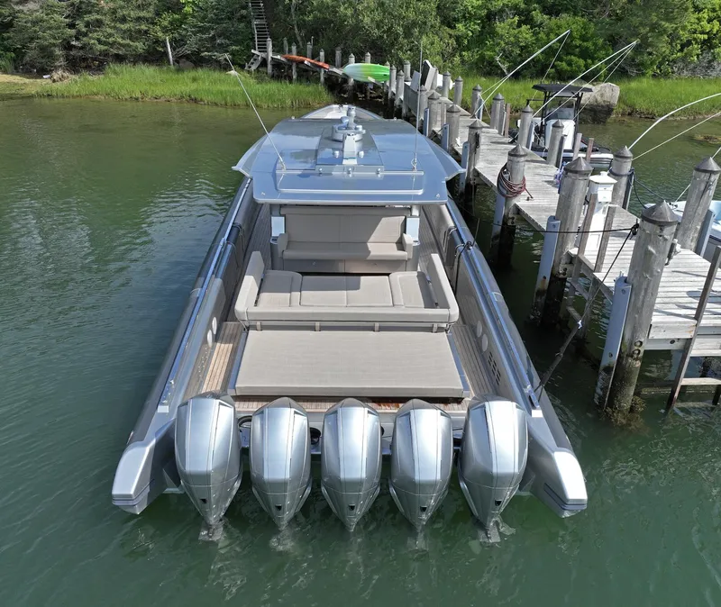 Slide: The Image of Novamarine Black Shiver 160, 2023 model, docked with four powerful engines, sleek design. - 7