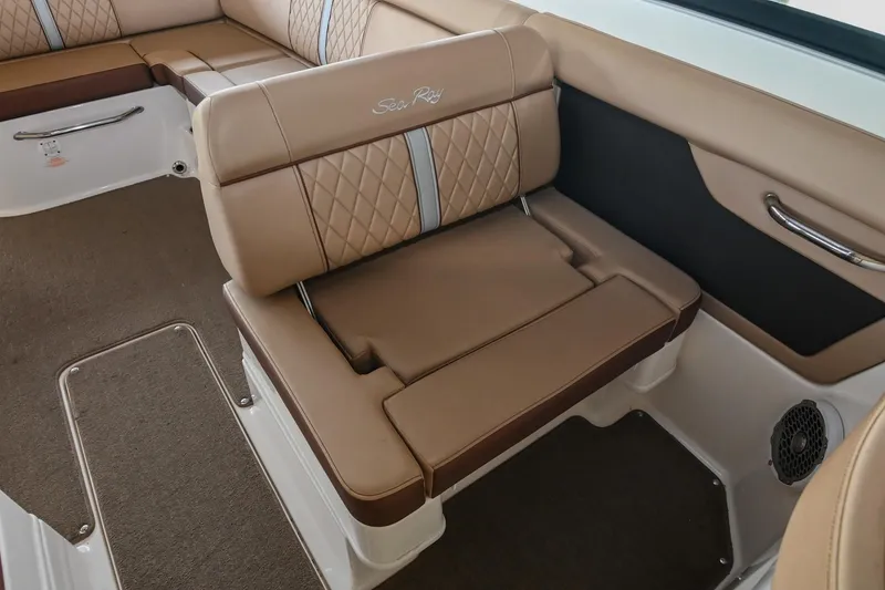 Slide: The Image of 2016 Sea Ray 270 Sundeck interior with tan leather seating and elegant design. - 26