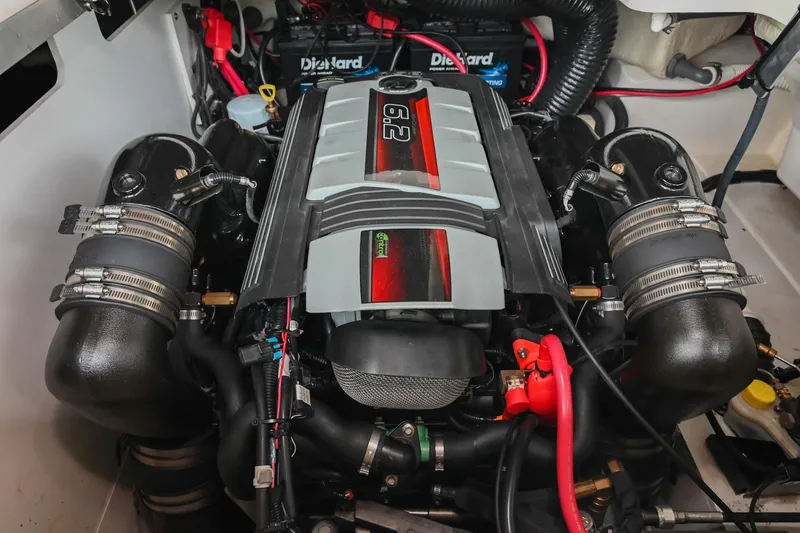 Slide: The Image of Engine of a 2016 Sea Ray 270 Sundeck boat, showcasing detailed components. - 39