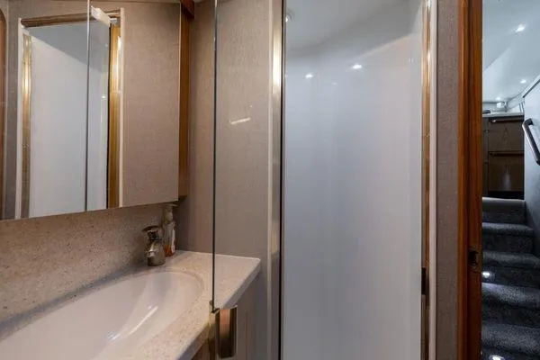 Slide: The Image of Luxurious bathroom interior of 2008 Ocean Yachts 46SS with modern fixtures and elegant design. - 15