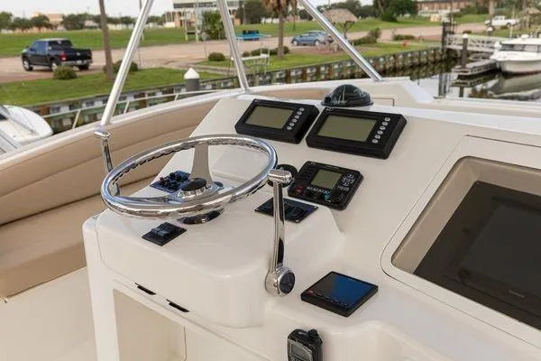 Slide: The Image of Helm of 2008 Ocean Yachts 46SS with navigation instruments and steering wheel. - 4