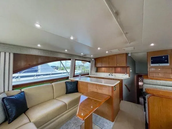 Slide: The Image of Luxurious interior of 2008 Ocean Yachts 46SS with modern furnishings and ample natural light. - 6