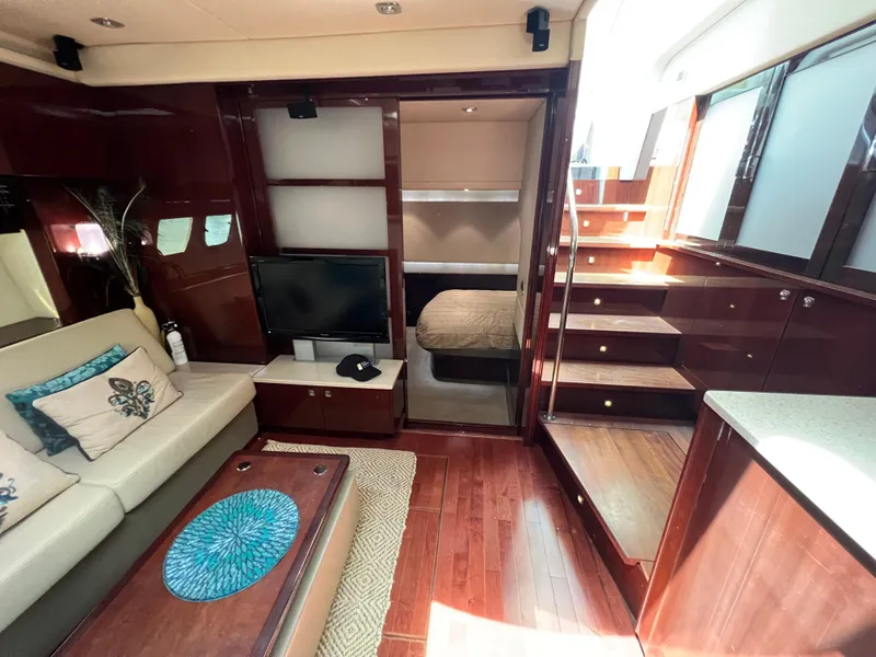 Slide: The Image of Luxurious interior of 2010 Sea Ray 540 Sundancer yacht with elegant wood finishes. - 18