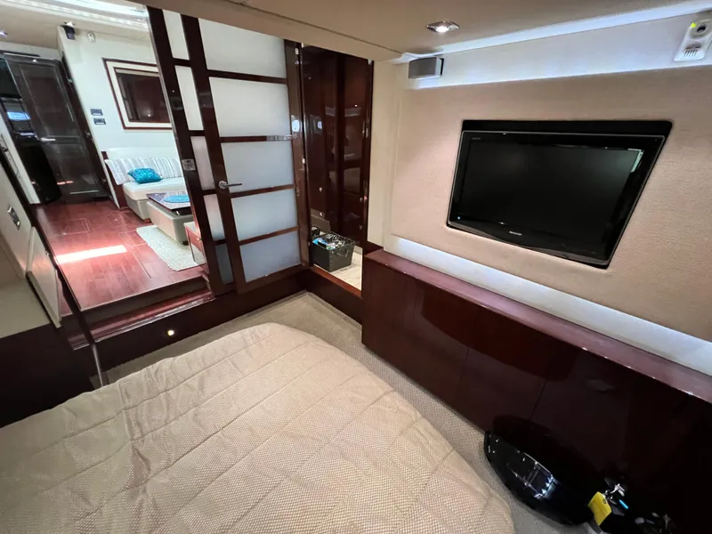 Slide: The Image of Luxurious interior of 2010 Sea Ray 540 Sundancer yacht with TV and modern furnishings. - 24