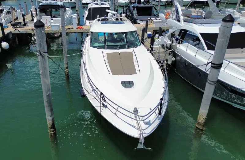 Slide: The Image of 2010 Sea Ray 540 Sundancer yacht docked at marina, aerial view. - 3