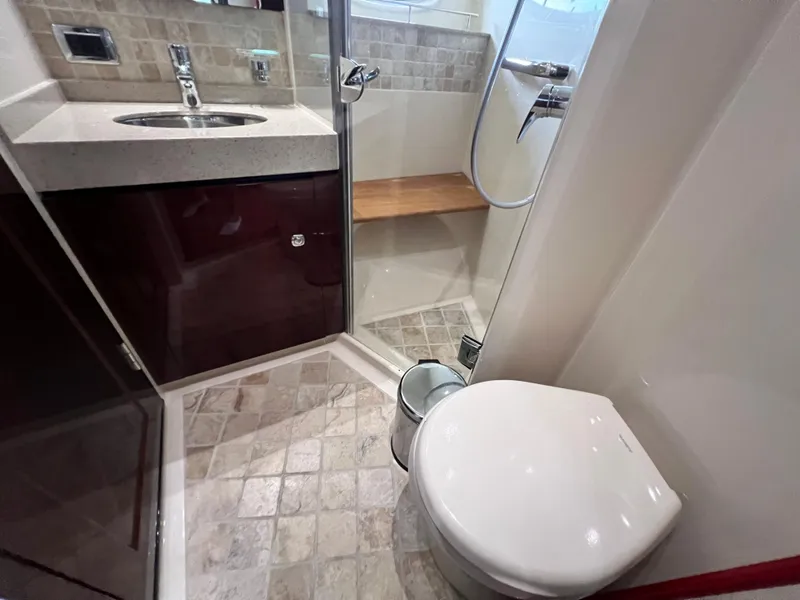 Slide: The Image of Bathroom interior of 2010 Sea Ray 540 Sundancer yacht with shower, sink, and toilet. - 31