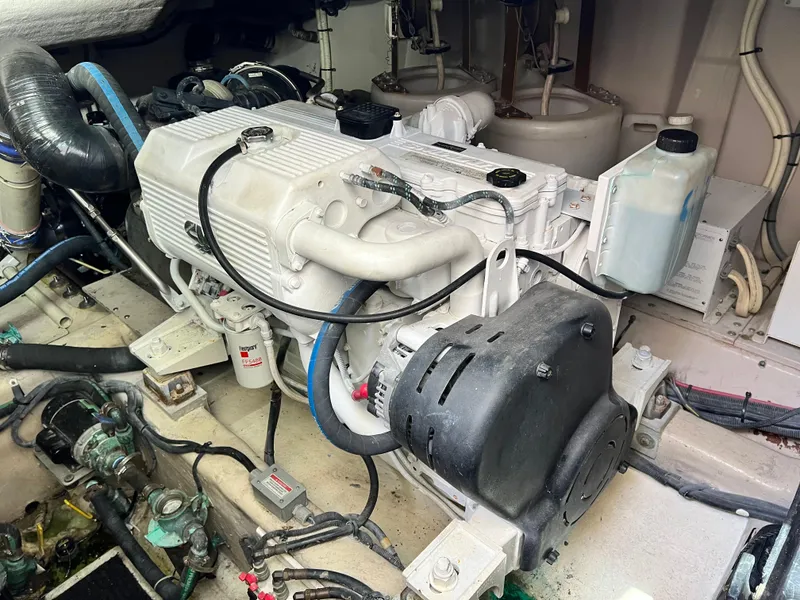 Slide: The Image of Engine room of 2010 Sea Ray 540 Sundancer, showcasing detailed mechanical components. - 35