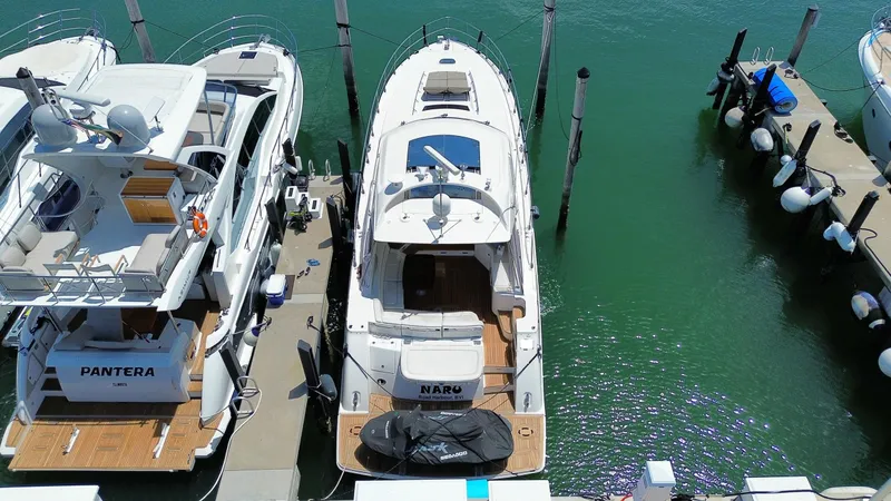Slide: The Image of 2010 Sea Ray 540 Sundancer yacht docked at marina, aerial view. - 4