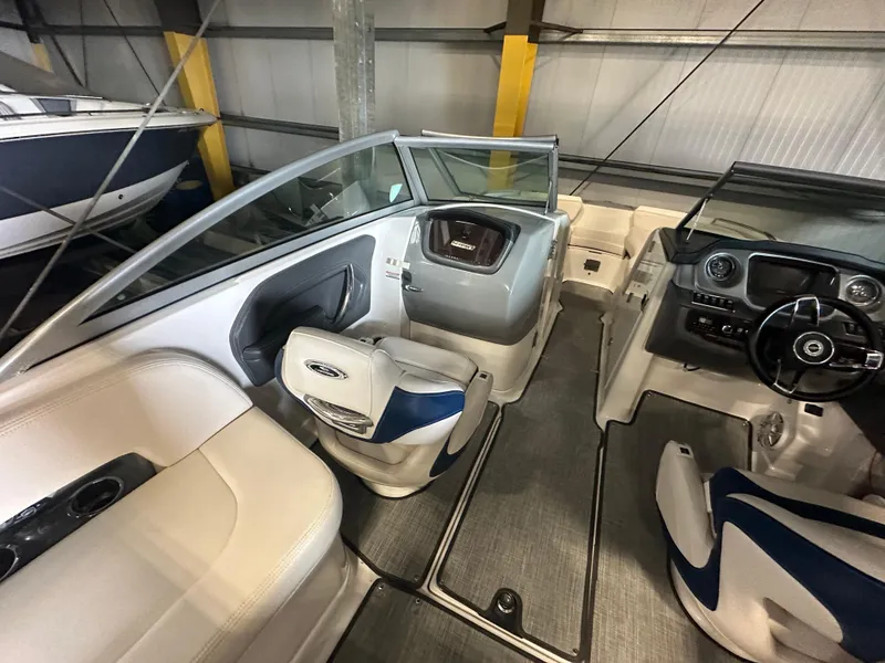 Slide: The Image of Interior of 2018 Chaparral 244 Sunesta boat with modern seating and dashboard. - 24