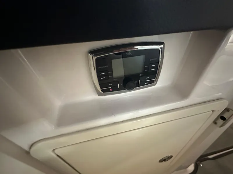 Slide: The Image of Control panel on 2018 Chaparral 244 Sunesta boat dashboard. - 43