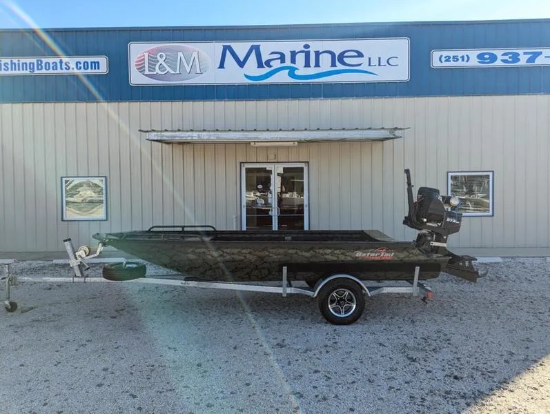 Slide: The Image of 2025 Gator Tail 1750 Savage Series boat outside L&M Marine LLC building. - 10