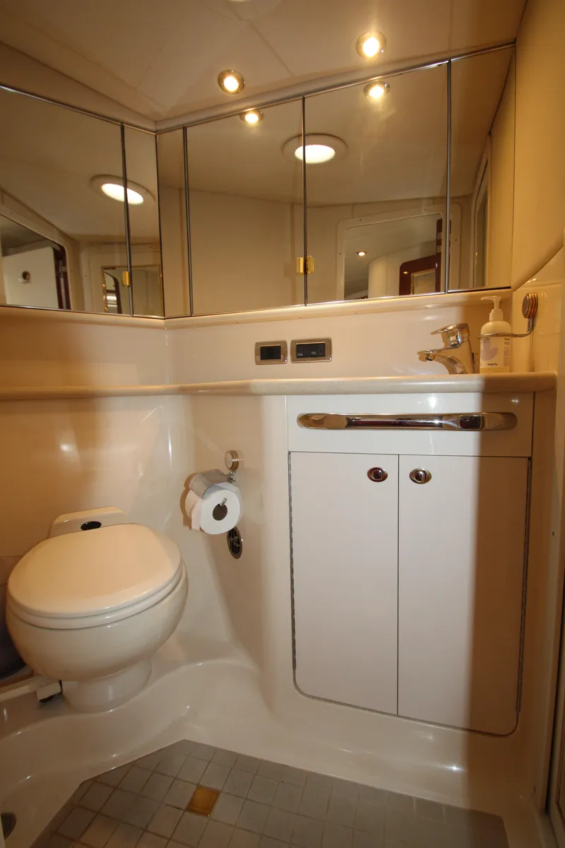 Slide: The Image of Luxurious bathroom in 2003 Sea Ray 550 Sundancer yacht with modern fixtures. - 49