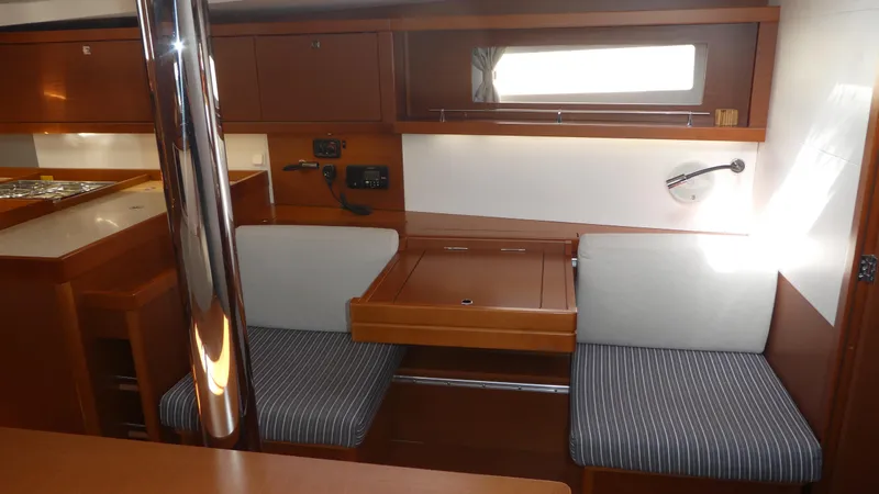 Slide: The Image of Interior of 2014 Beneteau Oceanis 41 sailboat with seating and table. - 11