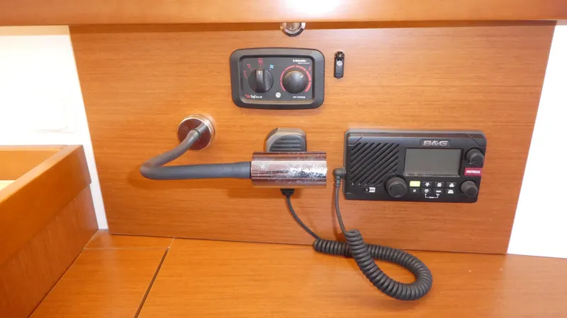 Slide: The Image of Control panel and radio equipment on 2014 Beneteau Oceanis 41 yacht. - 14