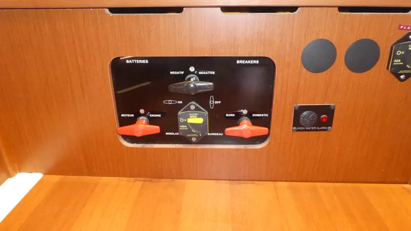 Slide: The Image of Control panel of a 2014 Beneteau Oceanis 41 sailboat, featuring battery and breaker switches. - 25